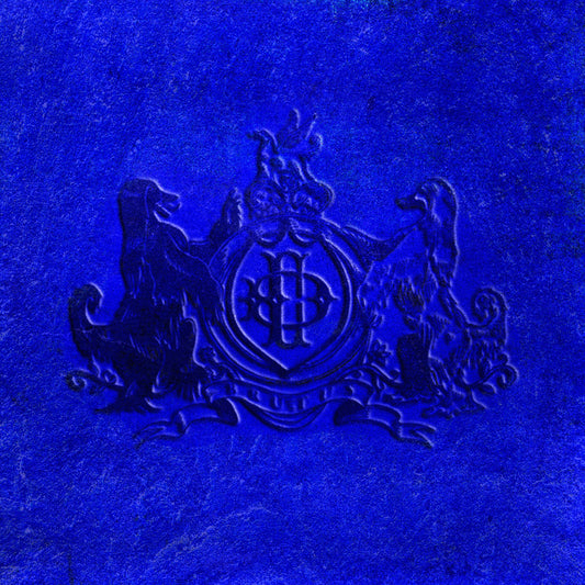 Blue CD cover for Daniel Caesar’s “NEVER ENOUGH” with embossed crest.