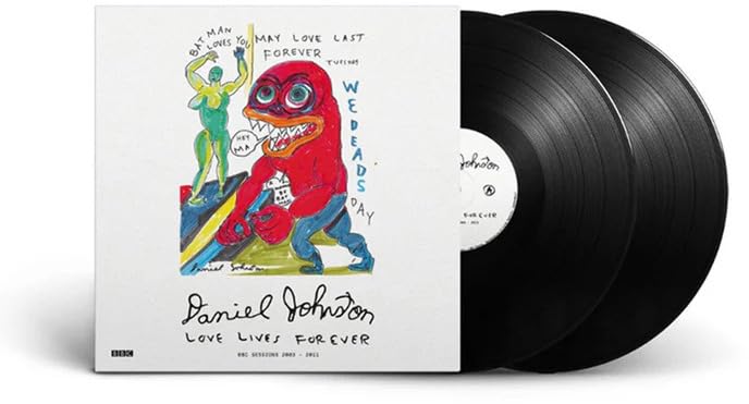 Daniel Johnston vinyl record with colorful, childlike monster illustration on cover.