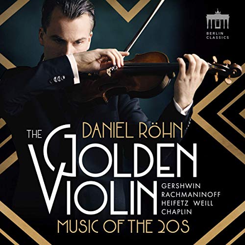 Man in black suit plays violin on a black and gold CD cover.