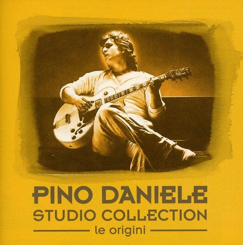 Pino Daniele album cover featuring a sepia-toned photo of him playing guitar.