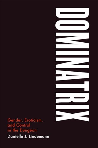 Book cover with large white “DOMINATRIX” text on a black background.