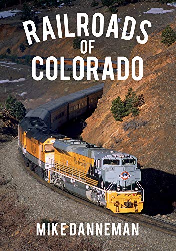 Book cover: yellow and gray train travels through a rocky landscape.