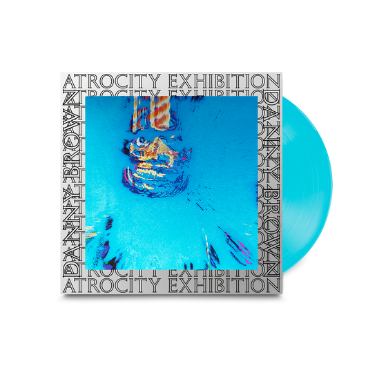 Danny Brown’s “Atrocity Exhibition” vinyl record with a blue and pink cover.
