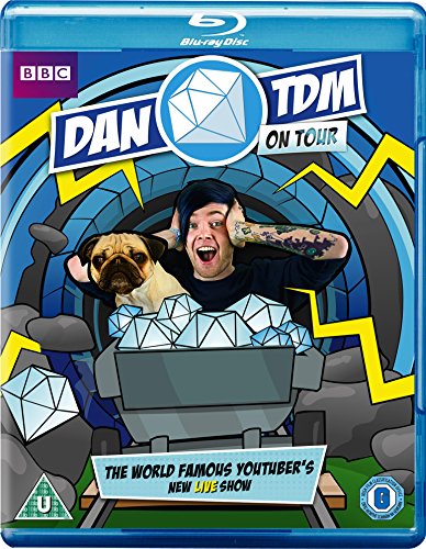 "Blu-ray case with cartoon man and dog, 'Dantdm On Tour' title and geometric shapes."