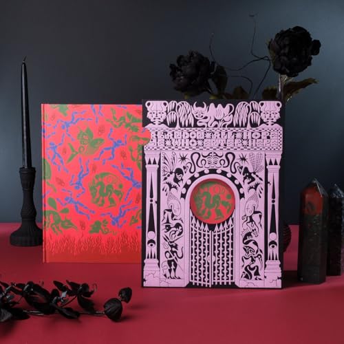 Pink and red illustrated book, “THE INFERNO,” with dark floral arrangement.