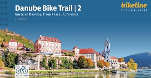 Cycling guide cover: Austrian Danube river town with church steeple.