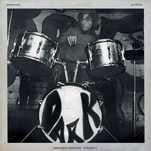 Black and white album cover featuring a drummer behind a drum kit.