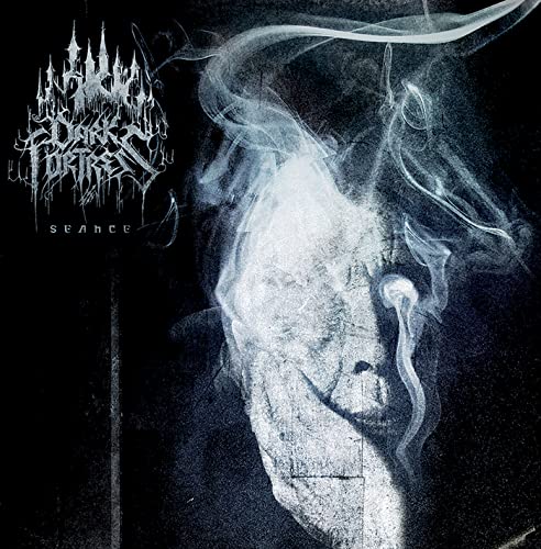 Dark Fortress album "Seance" cover: ghostly face dissolving into smoke.