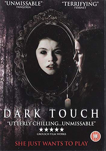 DVD cover for "Dark Touch" featuring a girl and her reflection in a mirror.