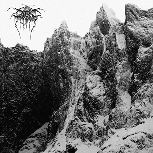 Black and white album cover depicting snowy mountains and band logo.