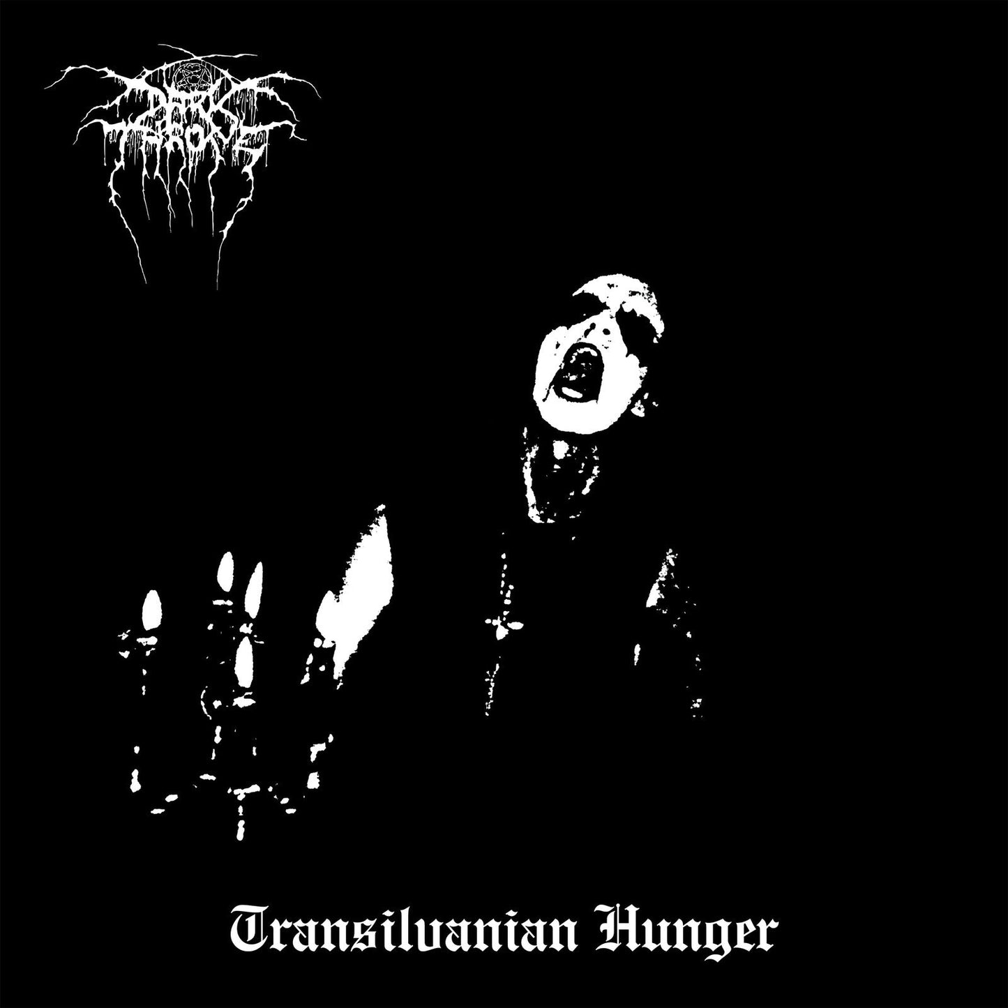 Black and white album cover featuring a figure with candles, "Transilvanian Hunger" text.