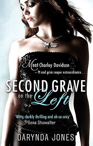 Book cover: woman with dark hair, title “Second Grave on the Left.”