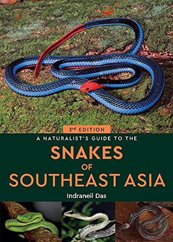 Book cover featuring a blue and red snake, titled "Snakes of Southeast Asia".