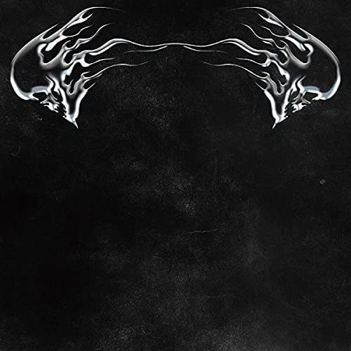 Silver, stylized animal skull design on a textured black background.