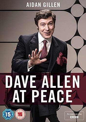 Aidan Gillen sits in a suit with a patterned tie on the DVD cover.