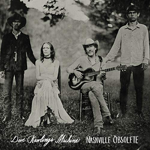 Black and white album cover featuring four people with instruments.