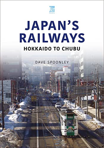 Book cover: Japanese street scene with a tram on the tracks.