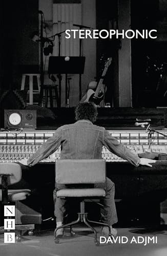 Black and white photo of a man at a recording console.