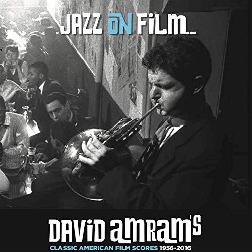 Black and white photo of David Amram playing a French horn, album cover.