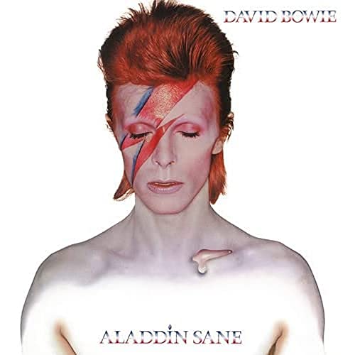 David Bowie’s “Aladdin Sane” album cover: portrait with red and blue makeup.
