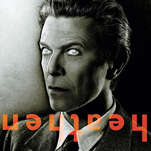 David Bowie's "Heathen" CD cover: portrait with bold, orange text.