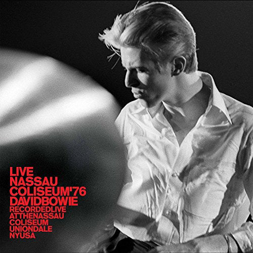 "Black and white vinyl album cover featuring David Bowie in a white shirt."