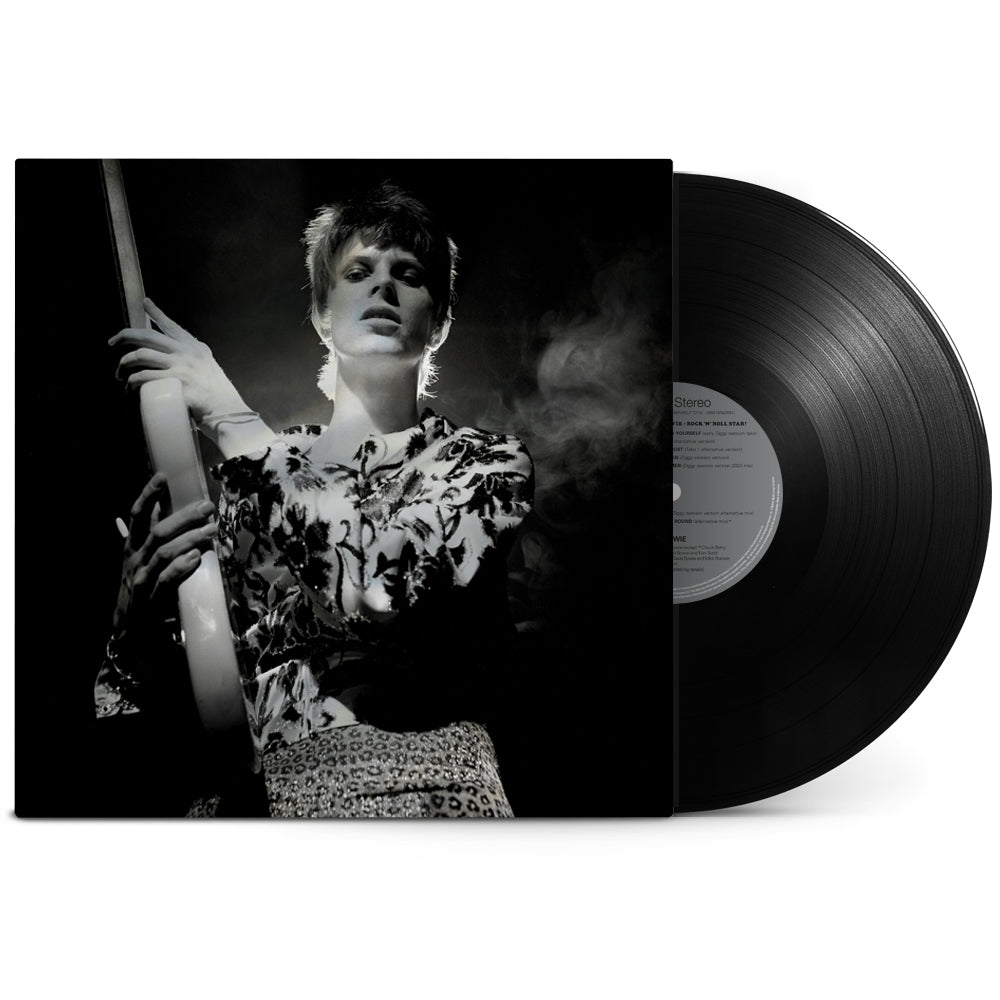 Black and white vinyl record featuring David Bowie in a patterned shirt.