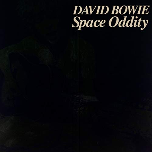David Bowie’s “Space Oddity” vinyl record cover, dark and atmospheric.