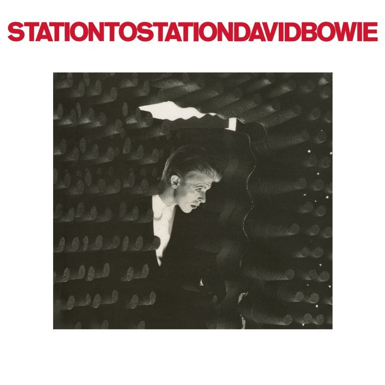Black and white album cover featuring David Bowie looking downward.