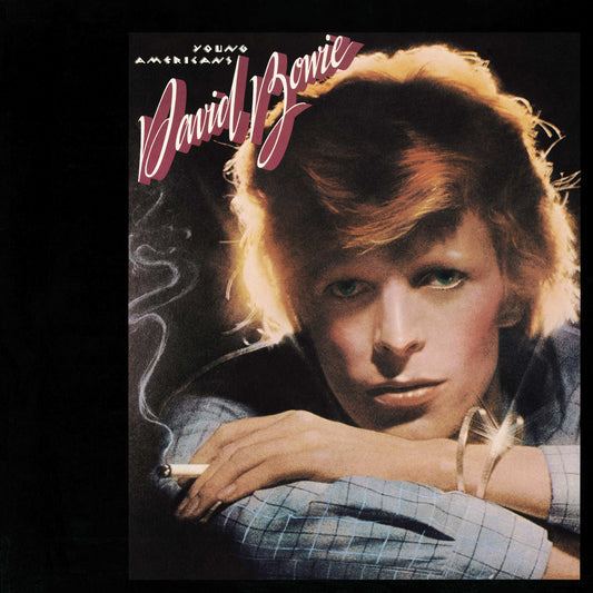 Close-up portrait of David Bowie holding a cigarette on the Young Americans album cover.
