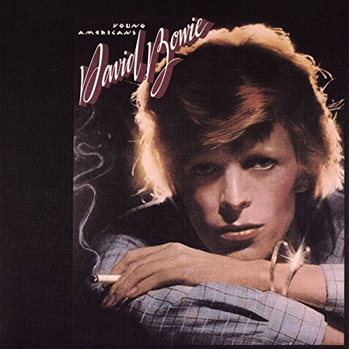 David Bowie's "Young Americans" vinyl album cover featuring a portrait of the artist.