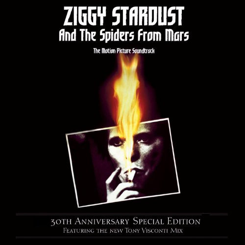 David Bowie's "Ziggy Stardust" vinyl album cover with a flame and portrait.