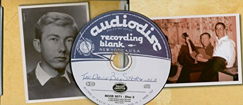 CD case with black and white photos of a young man with a guitar.