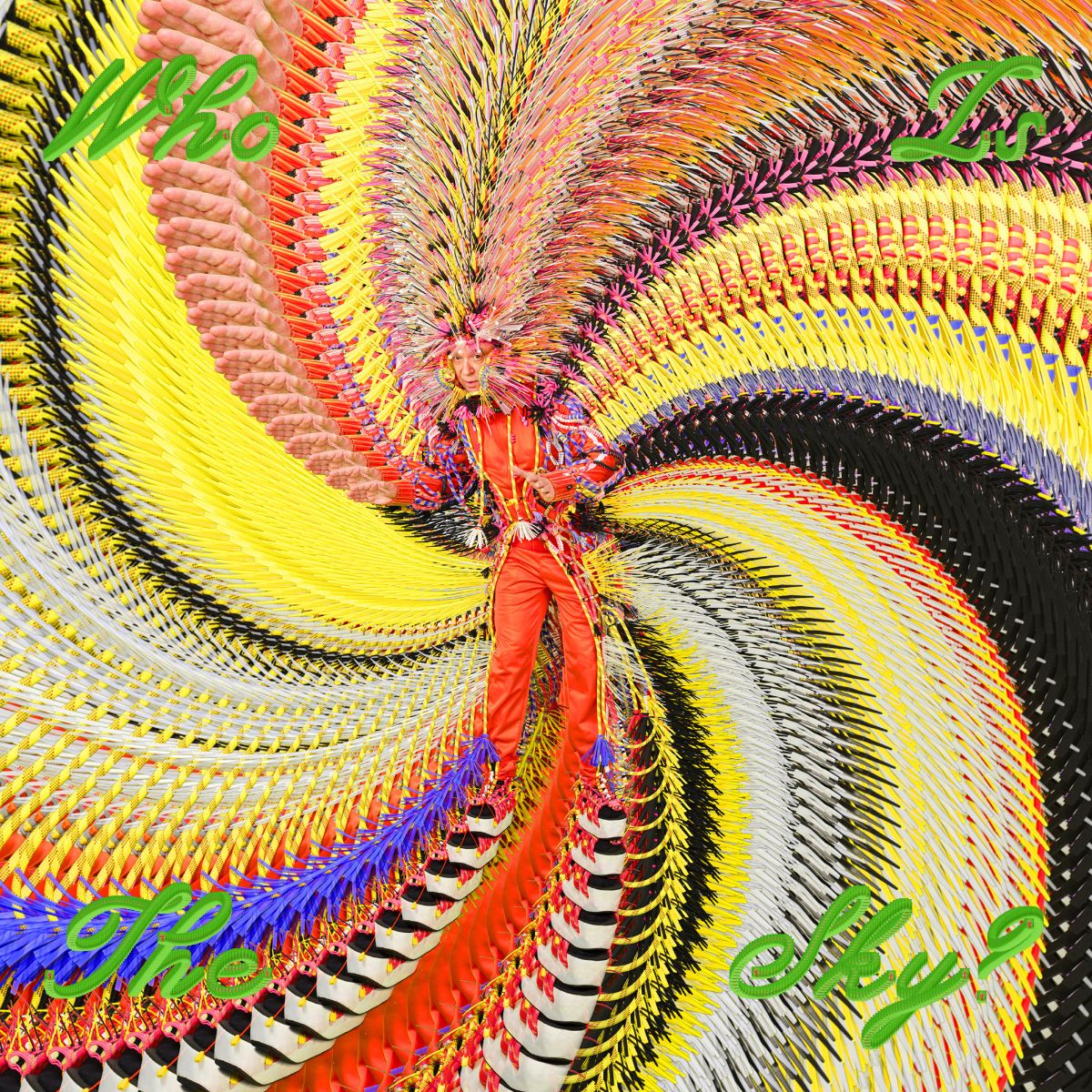 David Byrne in red suit amidst swirling, colorful, abstract patterns.