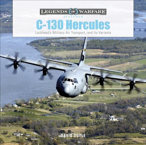 C-130 Hercules military transport aircraft in flight over landscape.