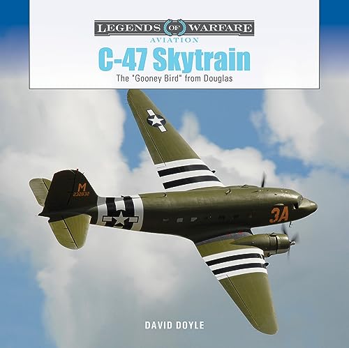 C-47 Skytrain aircraft in flight, olive drab with black and white stripes.