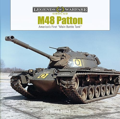 M48 Patton tank, olive drab color, front view, treads visible.
