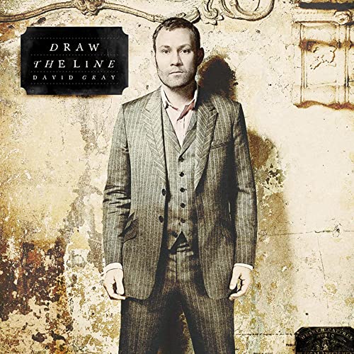 David Gray album cover, "Draw The Line," featuring a man in a suit.
