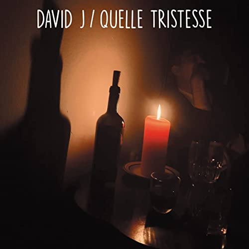 CD cover: wine bottle, candle, and glasses in dim lighting.