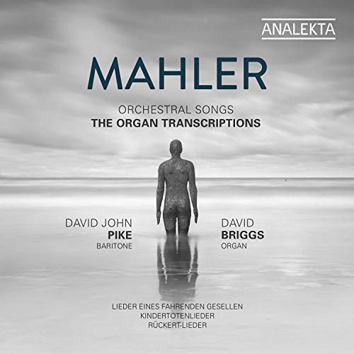 "CD cover featuring a black and white image of a man standing in water."