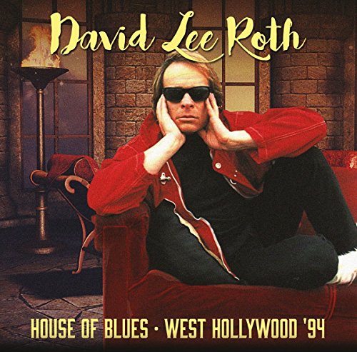 David Lee Roth album cover featuring him lounging in a red chair.