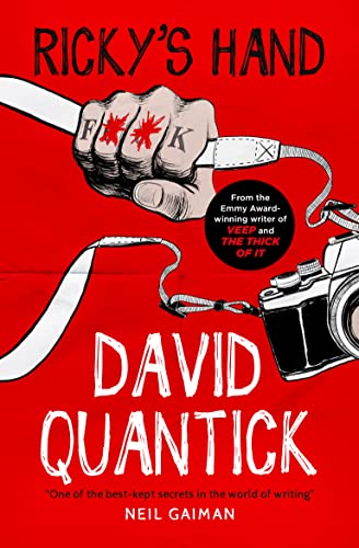 Book cover: clenched fist with knuckles spelling "F**K" and a camera.