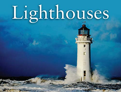 White lighthouse standing amidst stormy seas and a blue sky.