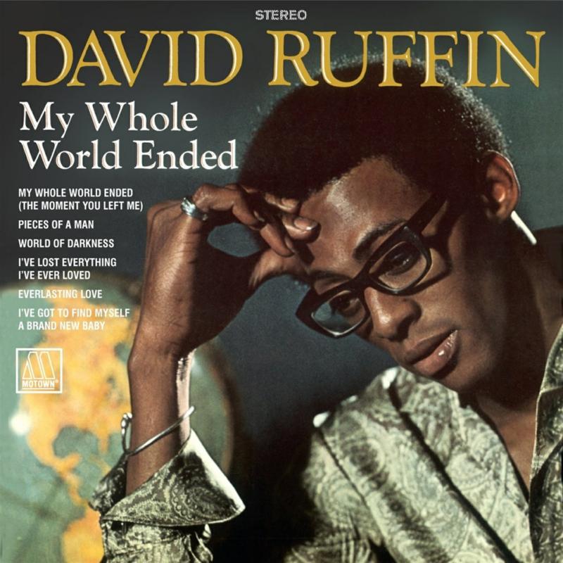 David Ruffin album cover, portrait of a man in a suit, gold background.