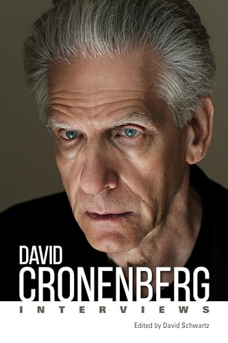 Close-up portrait of David Cronenberg, book cover titled "David Cronenberg: Interviews".