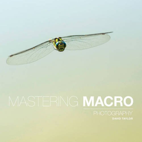 Dragonfly in flight with book cover text "Mastering Macro Photography".