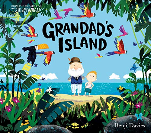 An elderly man and a young boy stand on a tropical beach with colorful parrots.