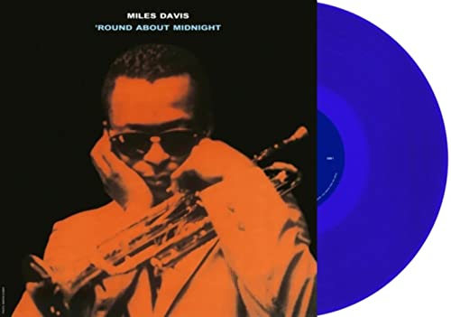 Miles Davis album cover with blue vinyl record beside it.