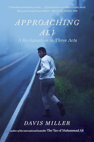 Book cover: Muhammad Ali running on a road, misty background.