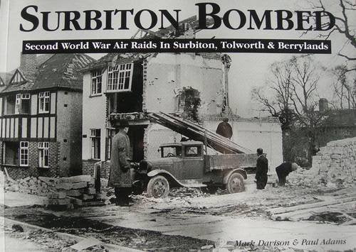 Book cover depicting bombed buildings and rescue workers in Surbiton.